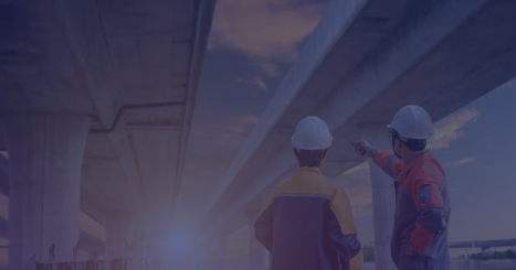 Engineers and contractors on construction site, following the progess of bridge and road infrastructure development. Two experts on construction platform in reflective wear with hardhats discussing project phases and successful previous developments.