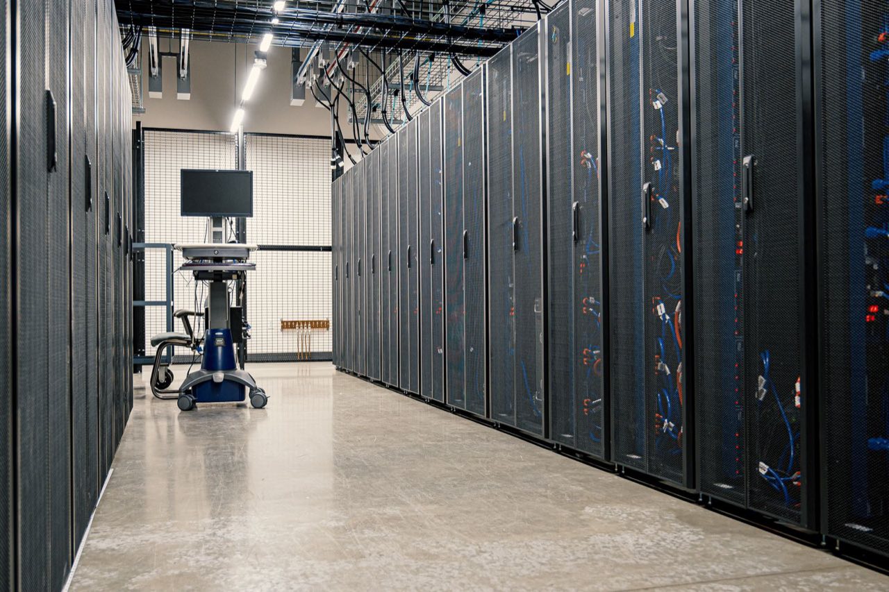 Server racks lining a data center aisle