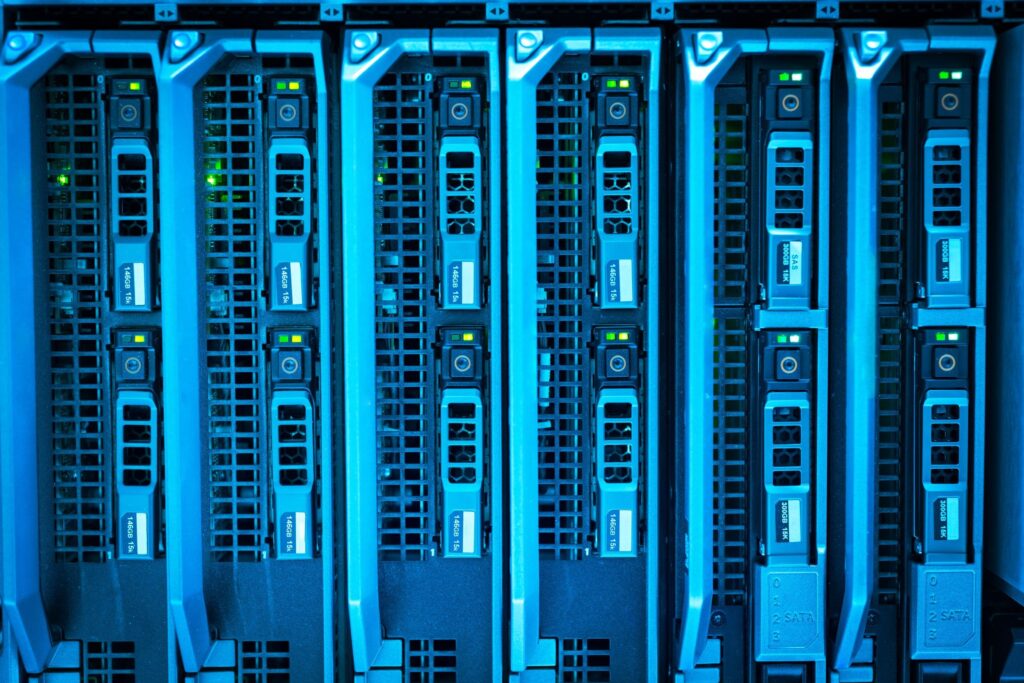 Blue-lit server blades in a secure data centre rack