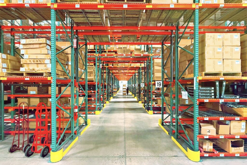 Stocked pallet racking in a distribution warehouse