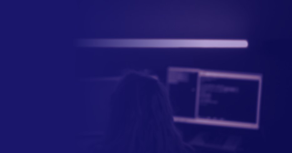 Security engineer monitoring dashboards at night